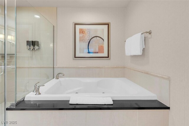 145 E Harmon Ave Unit 2603, Las Vegas, NV 89109 - full bathroom featuring a whirlpool tub
