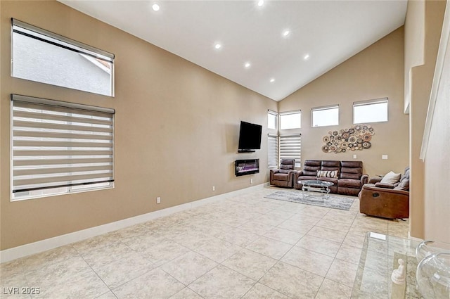 tiled living room with high vaulted ceiling