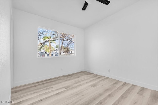 unfurnished room with ceiling fan and light hardwood / wood-style floors