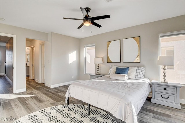 bedroom with hardwood / wood-style floors and ceiling fan