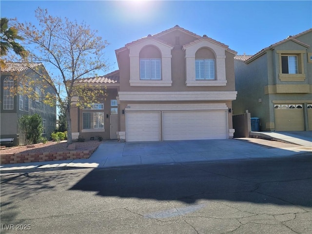 view of front of property with a garage