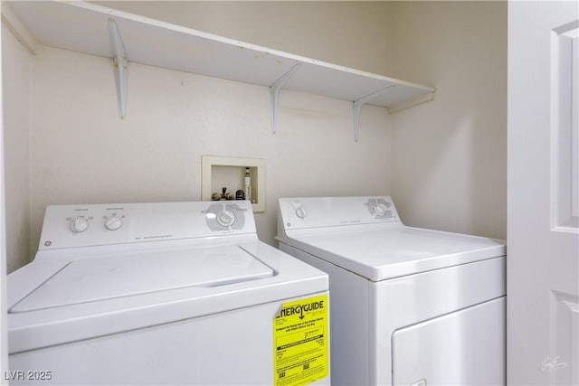 laundry area featuring washing machine and dryer