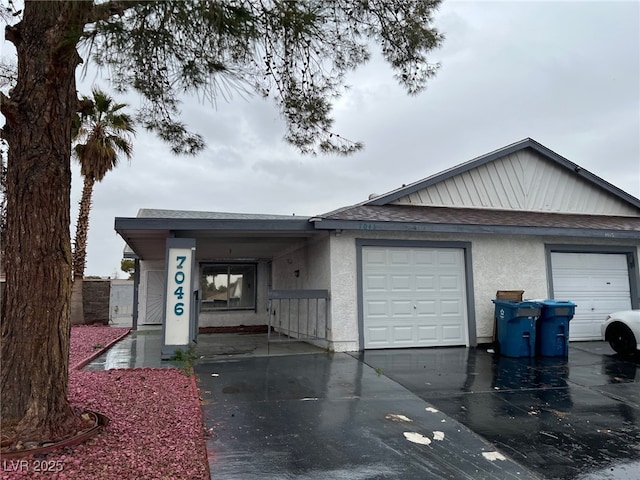 single story home featuring a garage