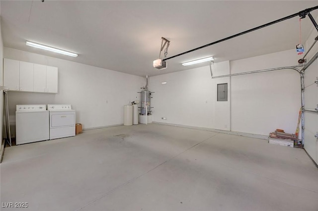 garage with independent washer and dryer, a garage door opener, electric panel, and water heater