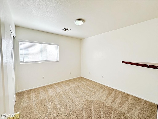 11036 Parete Ct, Las Vegas, NV 89141 - spare room featuring carpet flooring and a textured ceiling