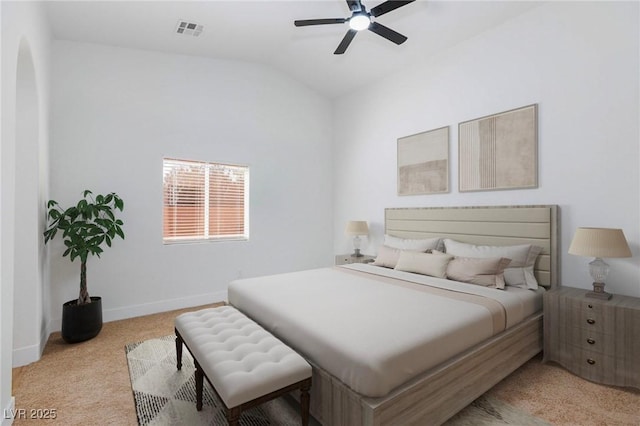 carpeted bedroom featuring vaulted ceiling and ceiling fan