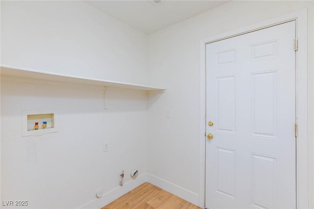 washroom with hookup for a gas dryer, wood-type flooring, and washer hookup