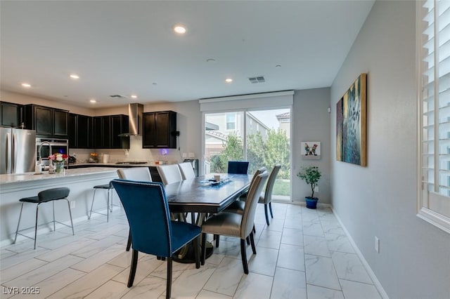 3192 Bormida Ave, Henderson, NV 89044 - dining room with recessed lighting, light marble finish flooring, and baseboards