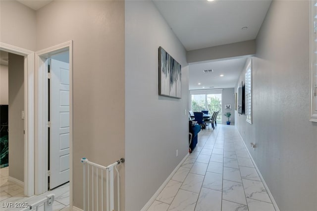 3192 Bormida Ave, Henderson, NV 89044 - hall with light marble finish floors, baseboards, and recessed lighting