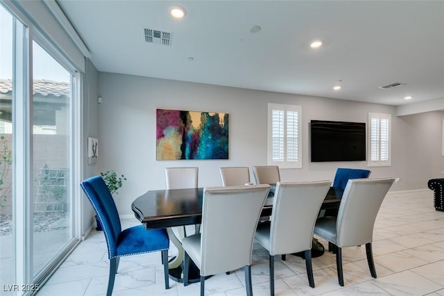3192 Bormida Ave, Henderson, NV 89044 - dining area with light marble finish flooring and recessed lighting