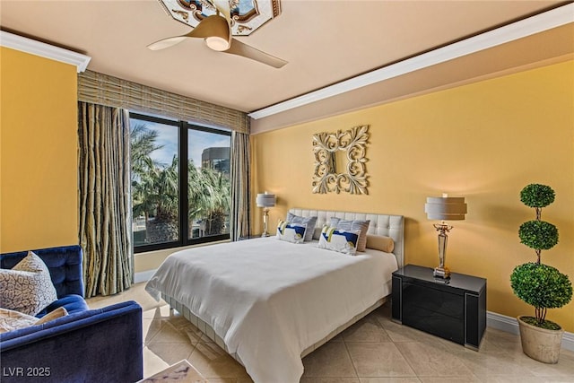 tiled bedroom featuring a ceiling fan, baseboards, and ornamental molding