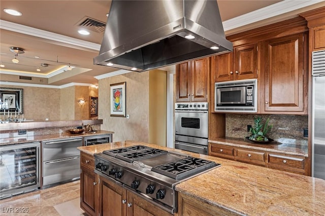 kitchen featuring visible vents, light stone countertops, wine cooler, island exhaust hood, and stainless steel appliances