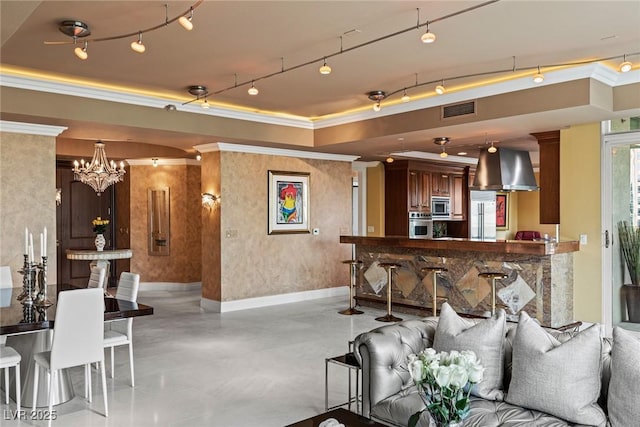 living room featuring a tray ceiling, visible vents, crown molding, and wallpapered walls