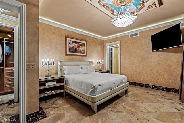 bedroom with stone finish floor, baseboards, visible vents, and ornamental molding