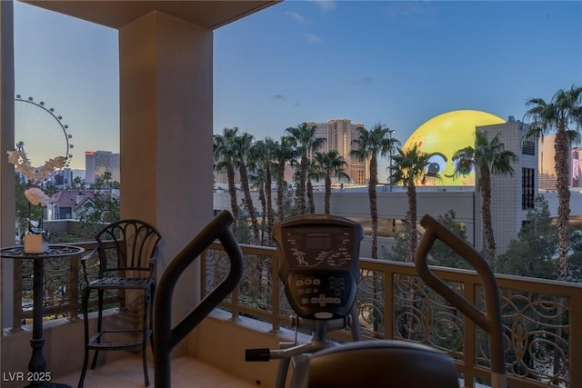 view of balcony at dusk