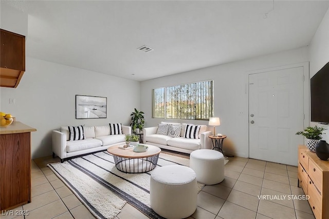 living room featuring light tile patterned floors