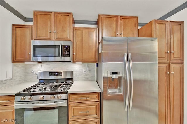 kitchen featuring tasteful backsplash and appliances with stainless steel finishes