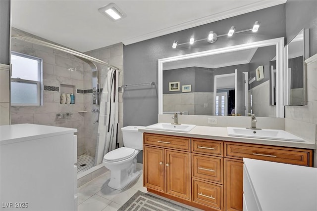 bathroom featuring walk in shower, ornamental molding, vanity, and toilet