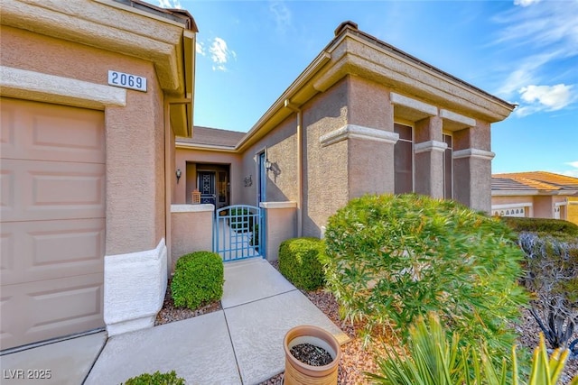 property entrance featuring a garage