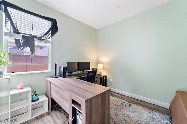 home office featuring light hardwood / wood-style floors