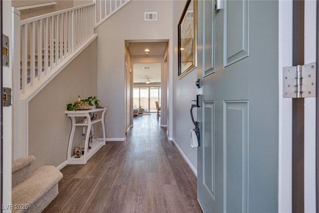 foyer with wood-type flooring