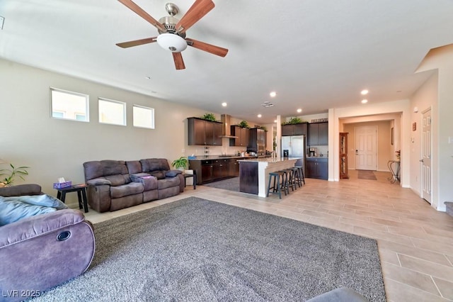 living room featuring ceiling fan