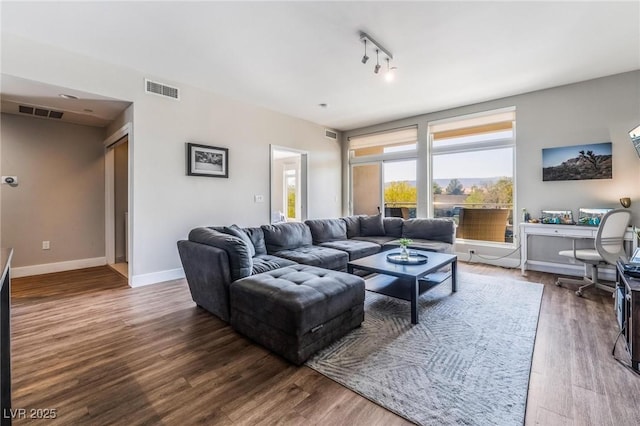 living room with wood-type flooring