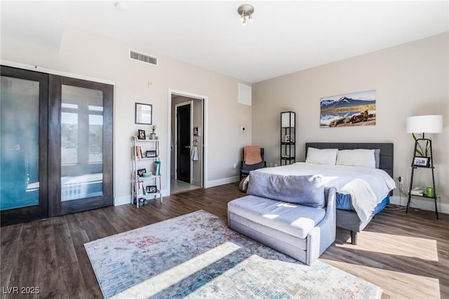 bedroom featuring dark wood-type flooring