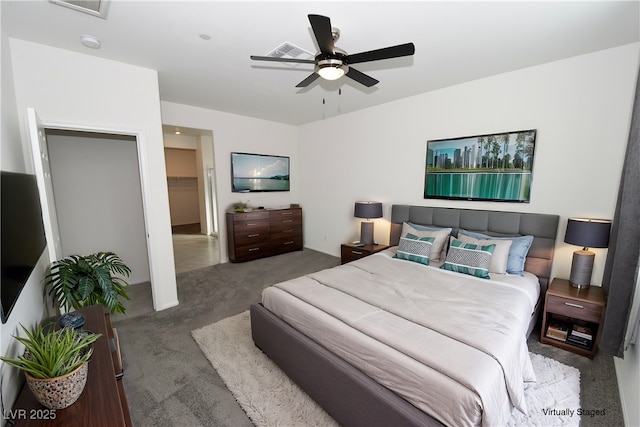 carpeted bedroom featuring ceiling fan