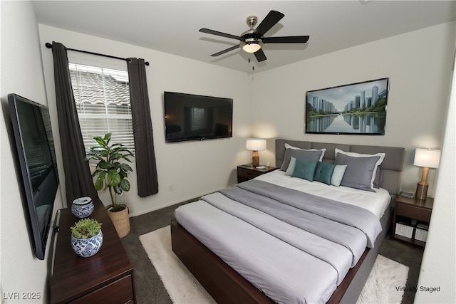 bedroom with ceiling fan and carpet floors