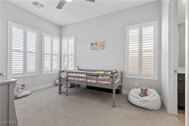 carpeted bedroom with ceiling fan