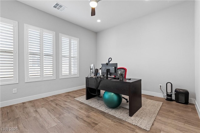 office area with ceiling fan and light wood-type flooring