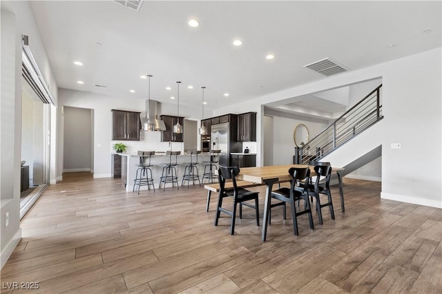 dining area featuring light hardwood / wood-style floors