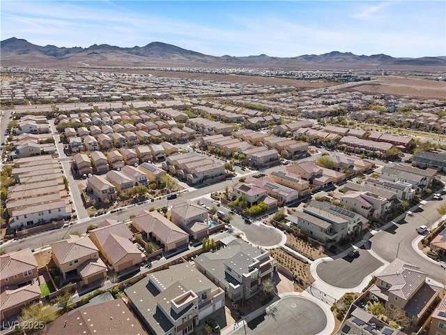 bird's eye view with a mountain view