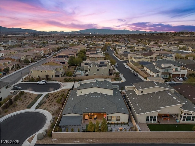 aerial view at dusk with a mountain view