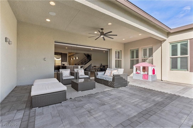 view of patio / terrace featuring ceiling fan and an outdoor hangout area