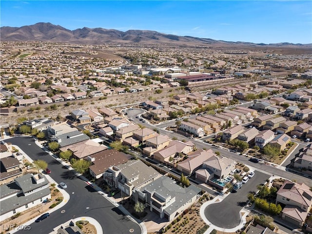 drone / aerial view featuring a mountain view