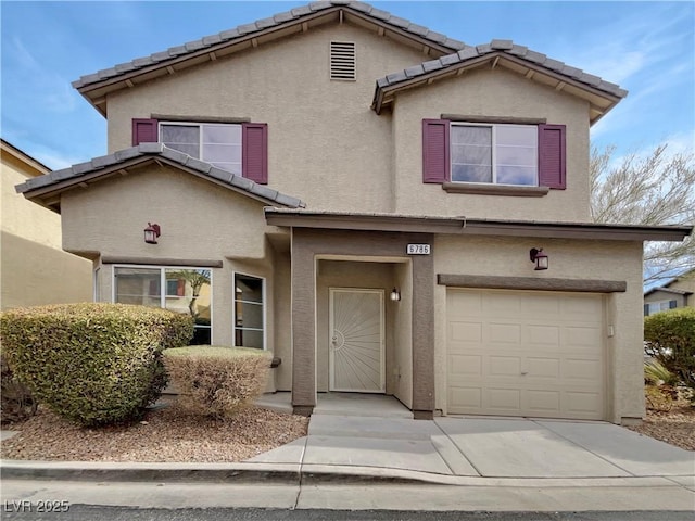 view of front of home with a garage