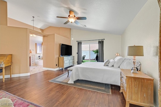 688 Quiet Stream Ct, Henderson, NV 89052 - bedroom featuring vaulted ceiling, hardwood / wood-style floors, access to outside, baseboards, and ensuite bathroom