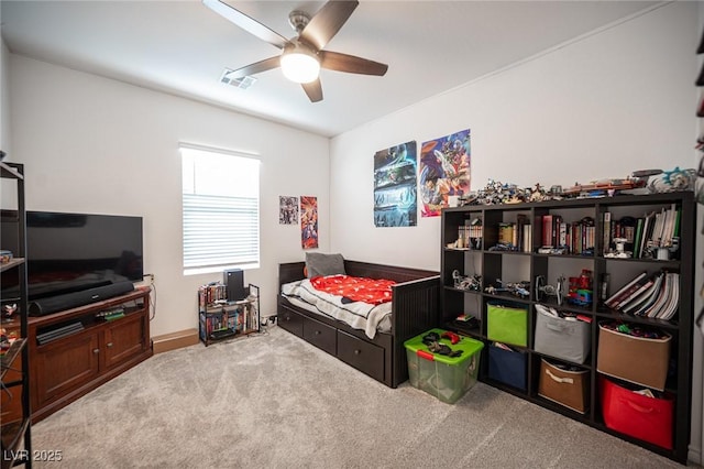 bedroom featuring ceiling fan and carpet flooring