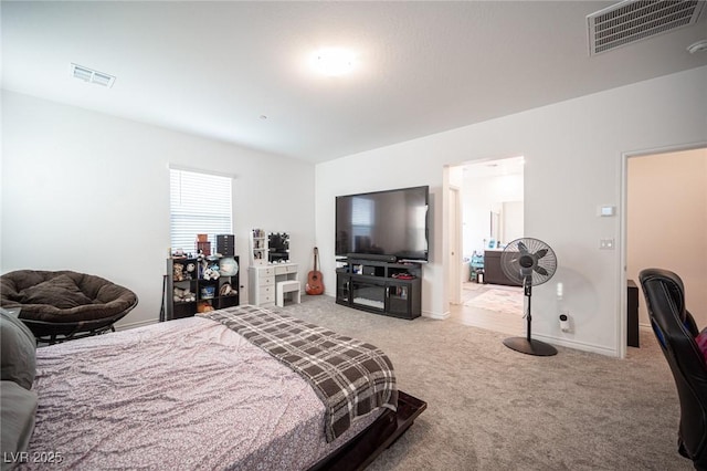 bedroom with light carpet