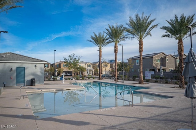 view of swimming pool with a patio