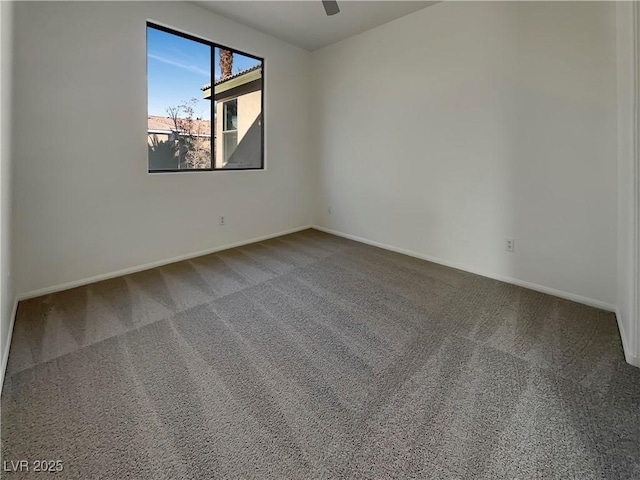 unfurnished room with carpet and ceiling fan