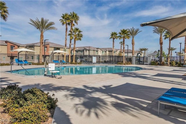 view of swimming pool featuring a patio area