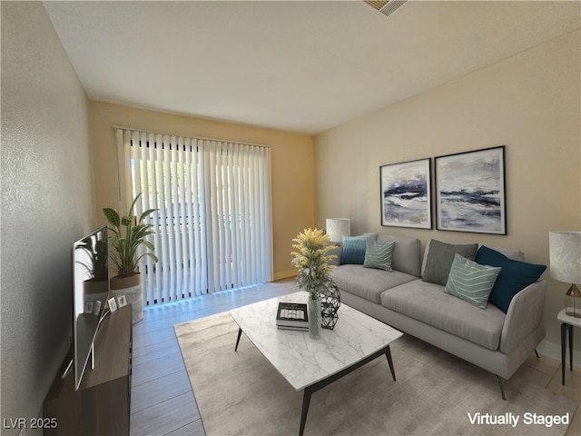 living room with hardwood / wood-style flooring