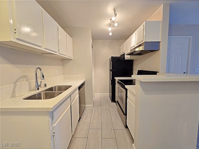 kitchen featuring white cabinetry, sink, and stainless steel appliances