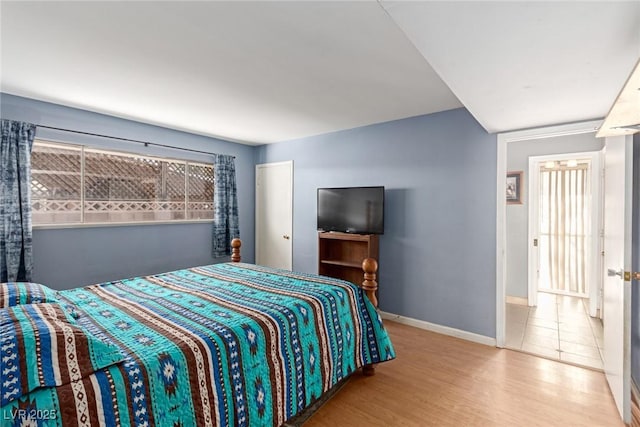 bedroom featuring light hardwood / wood-style floors