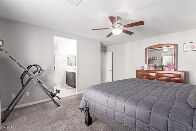 carpeted bedroom featuring ceiling fan and connected bathroom