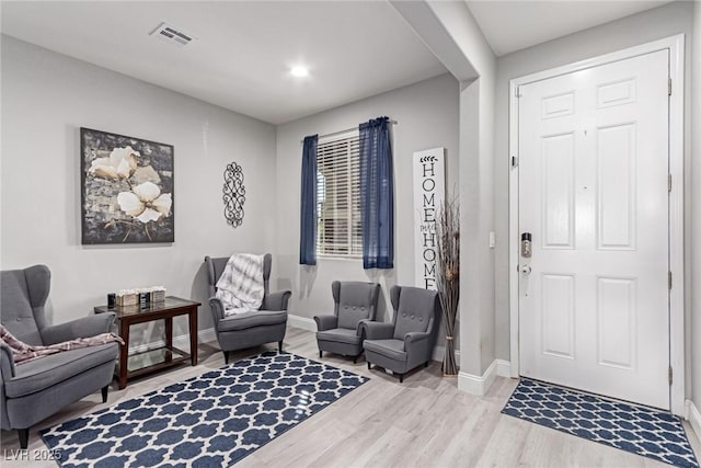 entrance foyer with light hardwood / wood-style floors