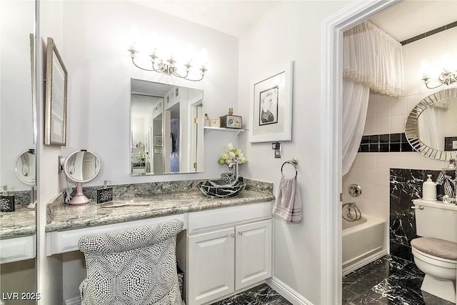 730 S Royal Crest Cir Unit 424, Las Vegas, NV 89169 - bathroom featuring marble tiled floors, toilet, shower / bathtub combination, and a chandelier